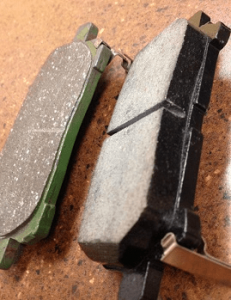 old and new brake pads