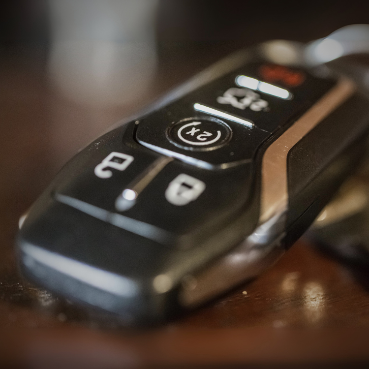 Close-up of a car remote key fob car Christmas gift recommendation.