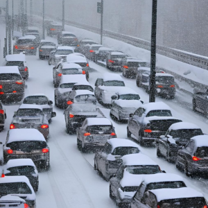 Commuters stuck in bumper to bumper traffic causing multiple winter car emergencies.