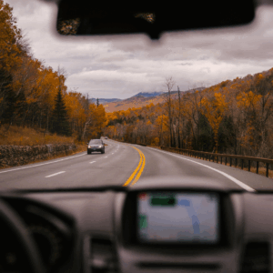Driver takes test drive in mountains to test ADAS calibration.