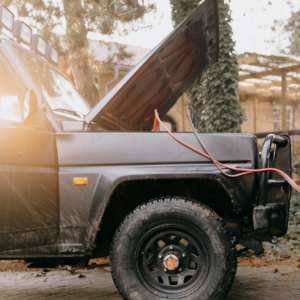 An SUV. with car battery problems gets a jumpstart.