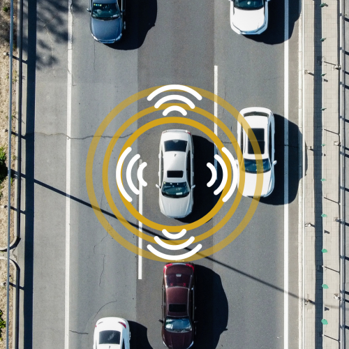 Car drives down highway with graphic overlay of adaptive driving assistance guides.